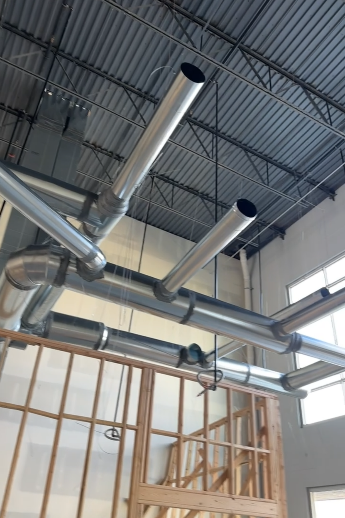 Custom sheet metal ductwork fabricated and installed by Honest Heating & Cooling in a commercial Utah building